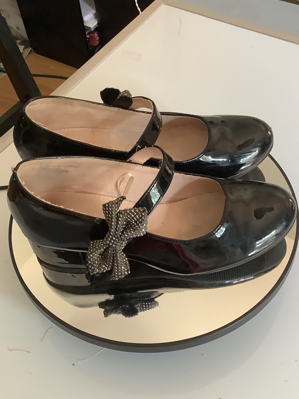 cupcakes & cashmere Black Patent Mary Jane Wedges with Embellished Bow